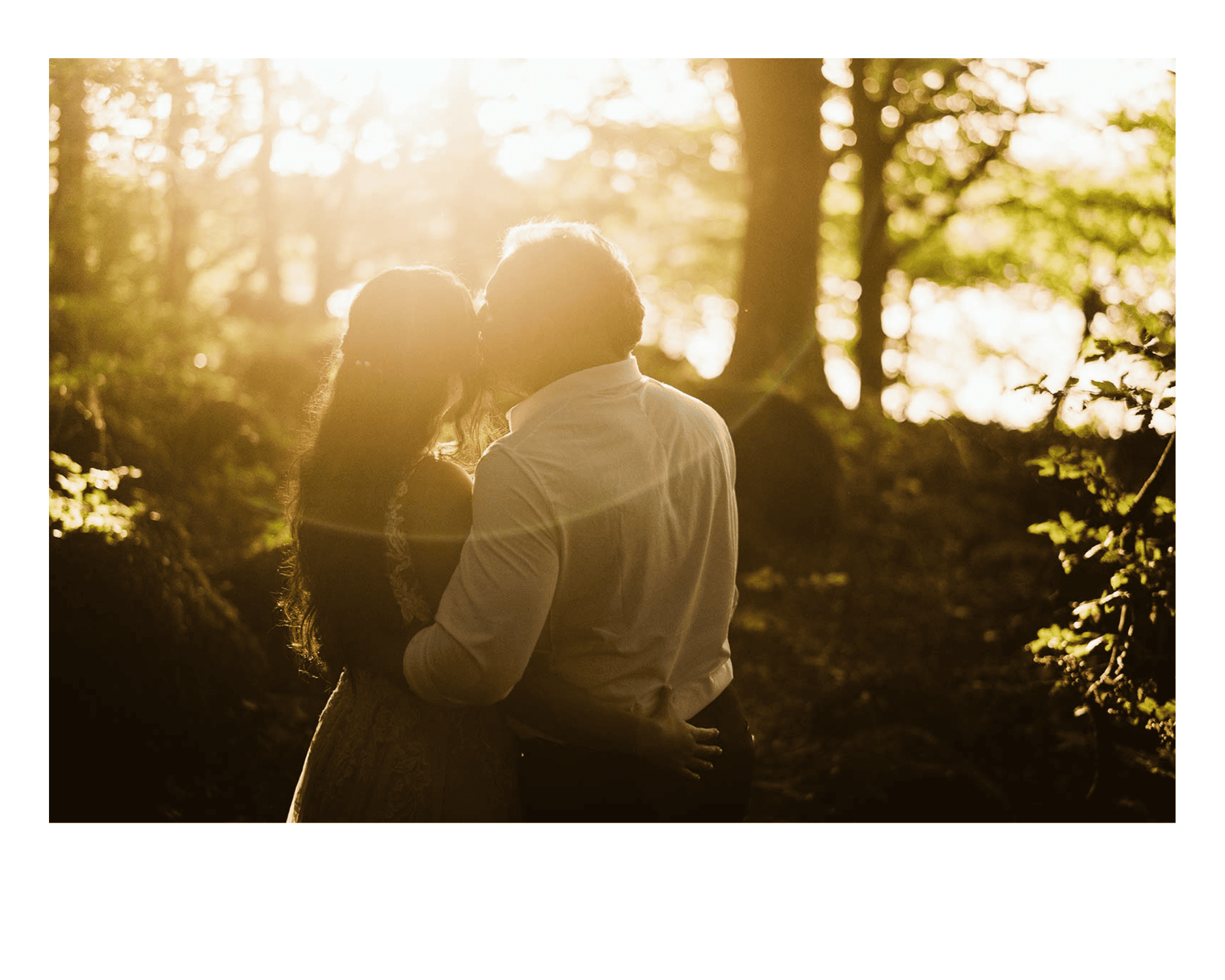couples in golden light while eloping in Ireland