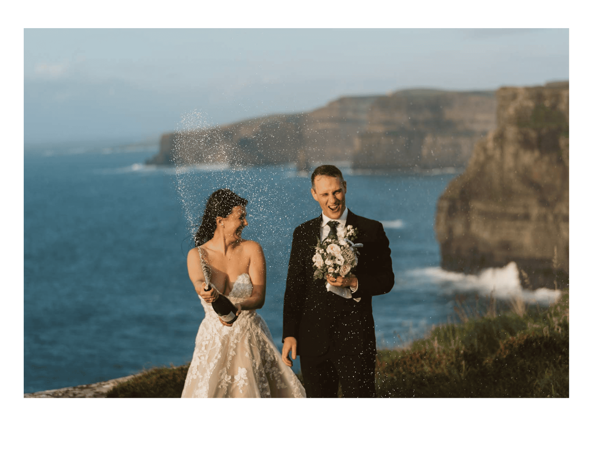 couple popping champagne when eloping in Ireland
