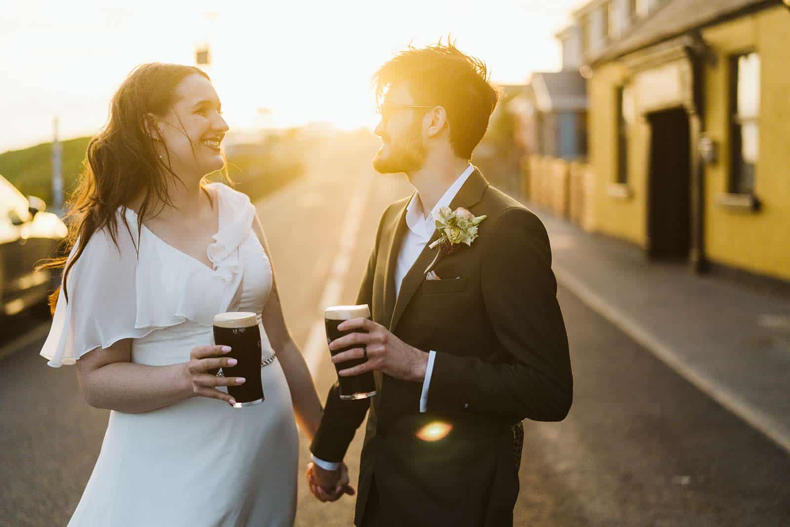 couples eloping in Ireland in sunset hours light