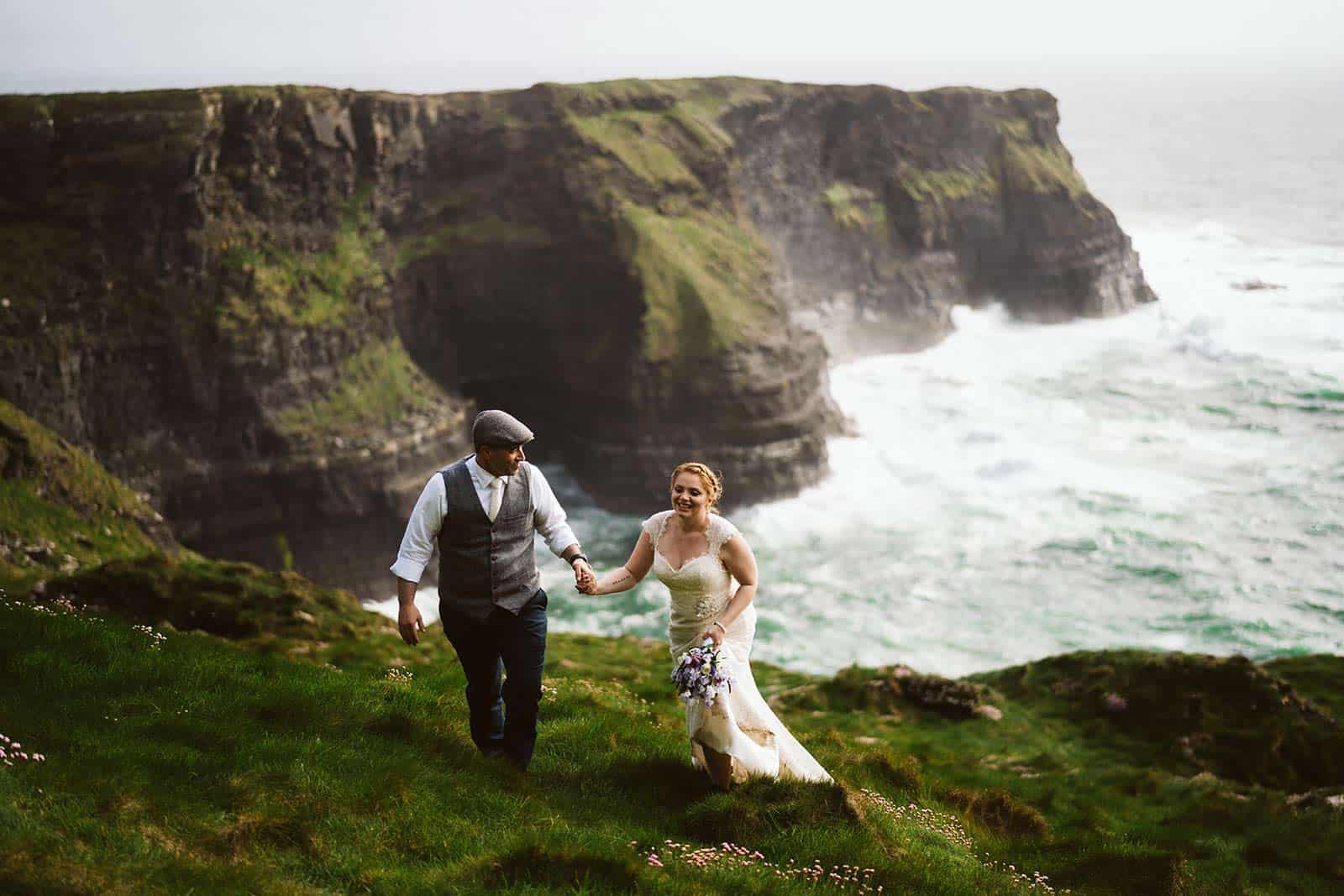 couple eloping in Ireland on the cliffs of Moher