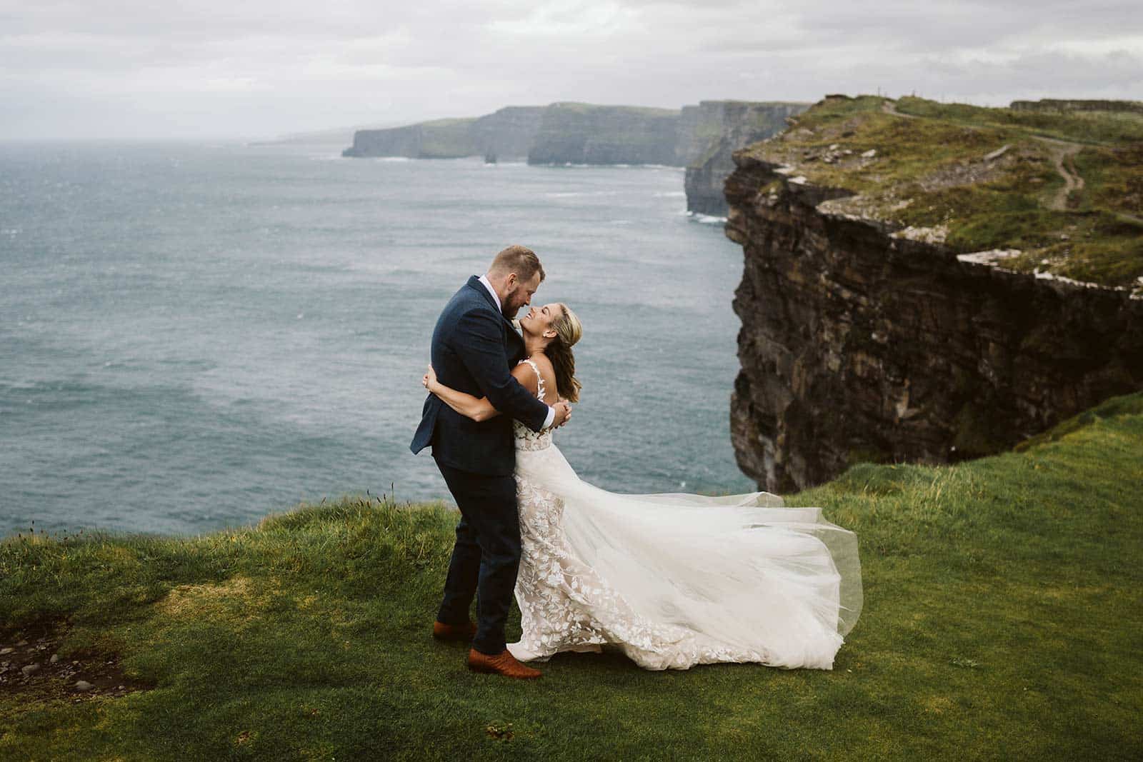 couple eloping in Ireland on the cliffs of Moher