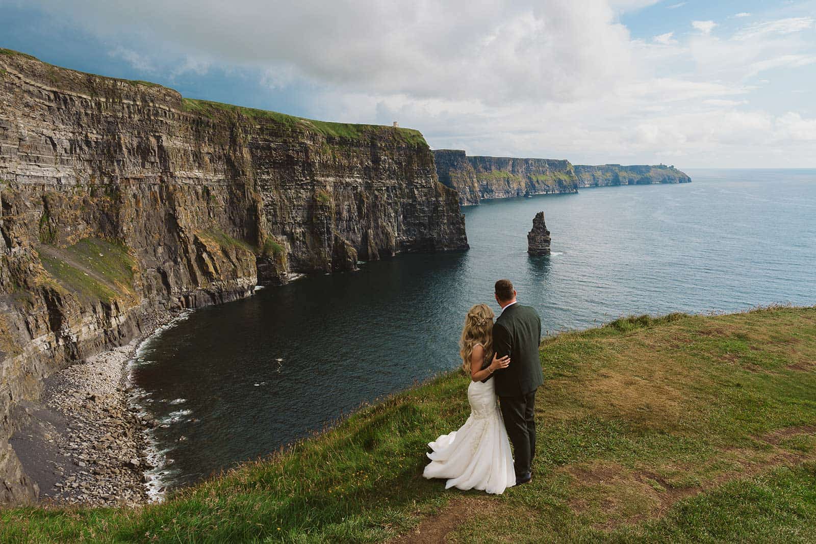 couple by the cliffs when eloping in Ireland